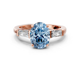 Rose gold Fancy Blue Oval  Solitaire with Tapered Baguette Side Stones on a Classic Band with Four-Prong Setting_73