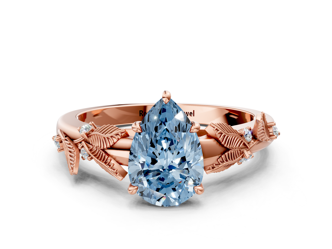 Rose gold Fancy Blue Pear  Brilliant Solitaire with Leaf Motif Band and Four-Prong Setting_63