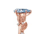 Rose gold Fancy Blue Pear  Brilliant Solitaire with Leaf Motif Band and Four-Prong Setting_68