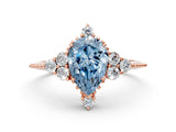 Rose gold Fancy Blue Pear Cut Brilliant Diamond with Cluster Setting on a Beaded Band and Four-Prong Setting