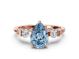 Rose gold Fancy Blue Pear Cut Brilliant Three-Stone Pave Band with Four-Prong Setting