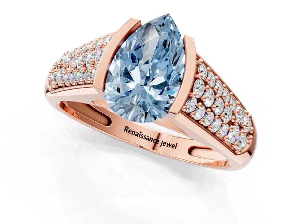 Rose gold Fancy Blue Pear Cut Diamond Channel Set Pave Band with Tension Prong Setting