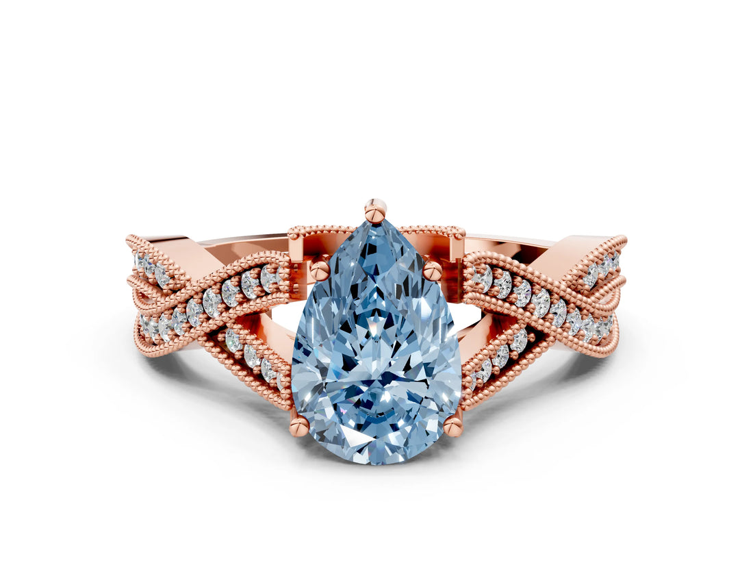 Rose gold Fancy Blue Pear Cut Cut Diamond Twisted Band with Milgrain Pave Setting and Four-Prong Setting