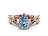 Rose gold Fancy Blue Pear Cut Cut Diamond Twisted Band with Milgrain Pave Setting and Four-Prong Setting