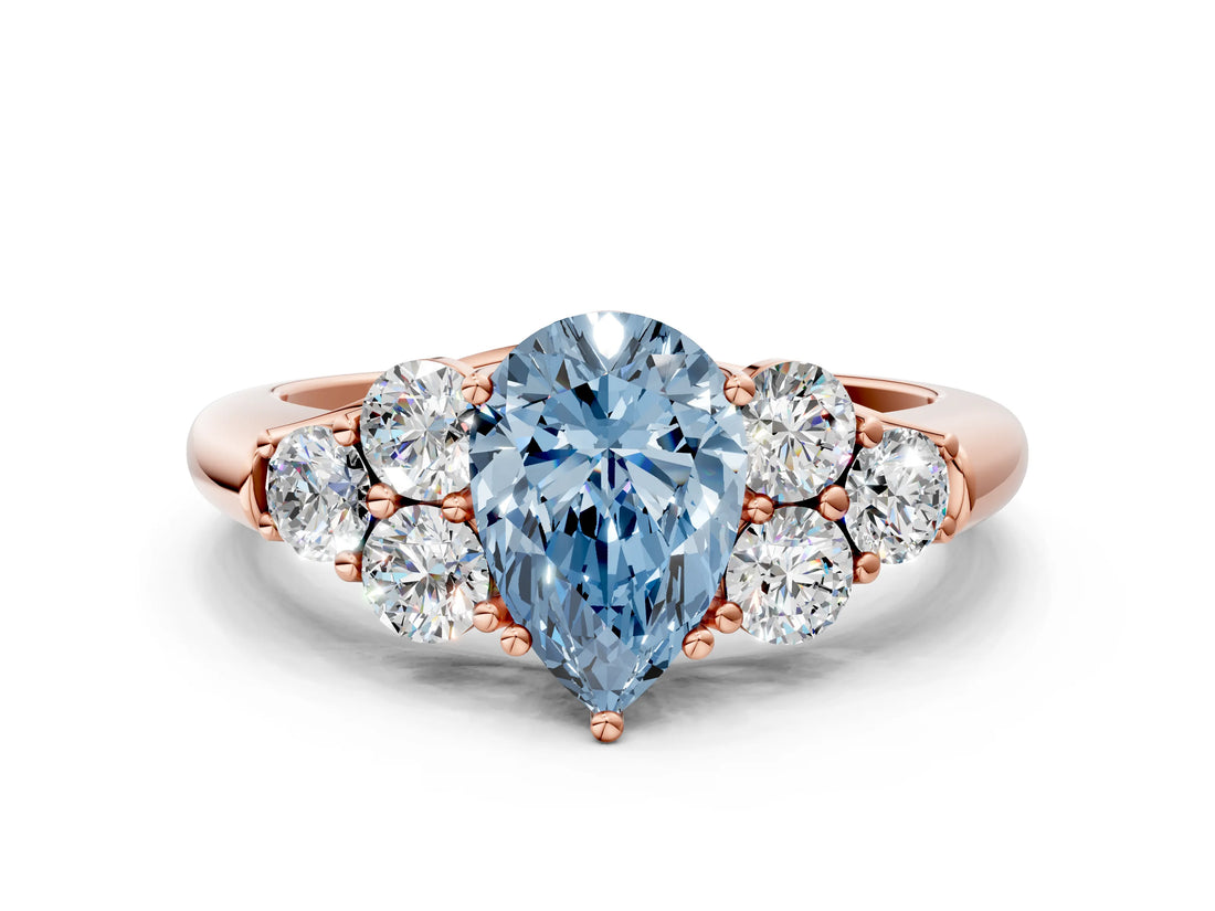 Rose gold Fancy Blue Pear  Cut Diamond Cluster Ring with Round Accent Stones and Prong Setting on a Classic Band_52