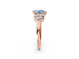 Rose gold Fancy Blue Pear  Cut Diamond Cluster Ring with Round Accent Stones and Prong Setting on a Classic Band_54