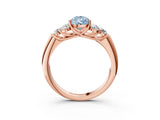 Rose gold Fancy Blue Pear  Cut Diamond Cluster Ring with Round Accent Stones and Prong Setting on a Classic Band_55