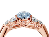 Rose gold Fancy Blue Pear  Cut Diamond Cluster Ring with Round Accent Stones and Prong Setting on a Classic Band_56