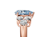 Rose gold Fancy Blue Pear  Cut Diamond Cluster Ring with Round Accent Stones and Prong Setting on a Classic Band_57