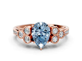 Rose gold Fancy Blue Pear  Cut Diamond Engagement Ring with Bezel Set Round Side Stones and Prong Setting_51