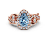 Rose gold Fancy Blue Pear Cut Diamond Halo Ring with Milgrain Pavé Band and Four-Prong Setting_54