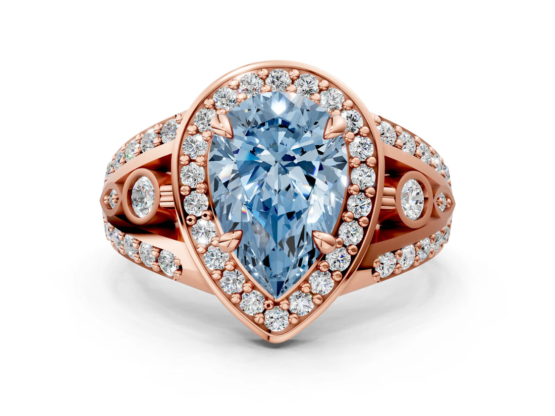 Rose gold Fancy Blue Pear Cut Diamond Halo Ring with Split Shank and Bezel Accents and Four-Prong Setting