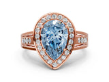 Rose gold Fancy Blue Pear Cut Diamond Halo Ring with Split Shank and Bezel Accents and Prong Setting