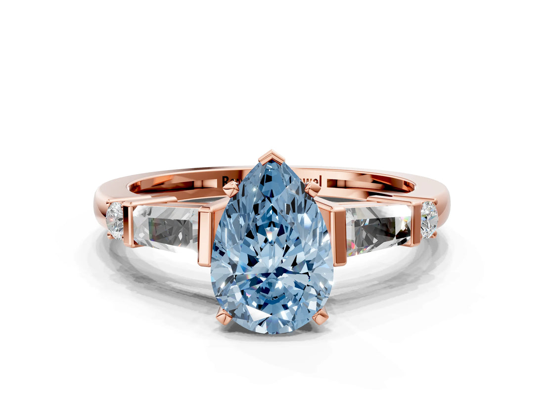 Rose gold Fancy Blue Pear  Cut Diamond Ring with Baguette Side Stones, Channel Set Band, and Four-Prong Setting_24