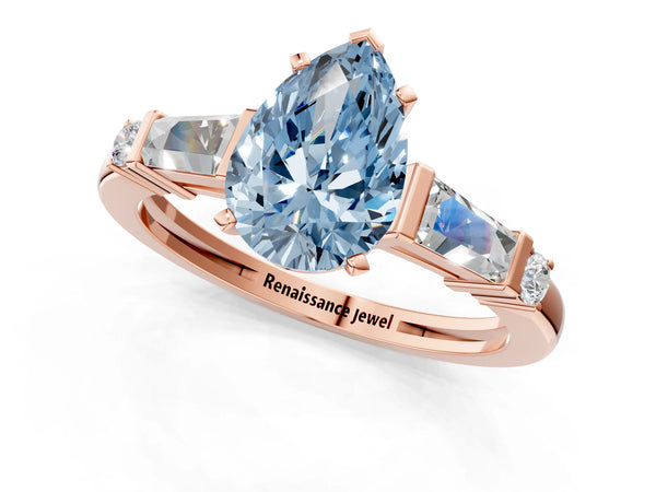 Rose gold Fancy Blue Pear  Cut Diamond Ring with Baguette Side Stones, Channel Set Band, and Four-Prong Setting