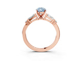 Rose gold Fancy Blue Pear  Cut Diamond Ring with Baguette Side Stones, Channel Set Band, and Four-Prong Setting_27