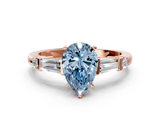 Rose gold Fancy Blue Pear  Cut Diamond Ring with Baguette Side Stones, Channel Set Band, and Four-Prong Setting_3