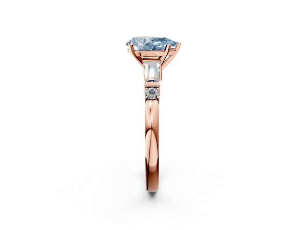 Rose gold Fancy Blue Pear  Cut Diamond Ring with Baguette Side Stones, Channel Set Band, and Four-Prong Setting