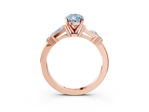 Rose gold Fancy Blue Pear  Cut Diamond Ring with Baguette Side Stones, Channel Set Band, and Four-Prong Setting