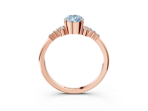Rose gold Fancy Blue Pear Cut Diamond Ring with Side Stones and Four-Prong Setting