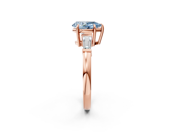 Rose gold Fancy Blue Pear  Cut Diamond Ring with Tapered Baguette Side Stones in Four-Prong Setting