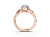 Rose gold Fancy Blue Pear  Cut Diamond Ring with Tapered Baguette Side Stones in Four-Prong Setting_6