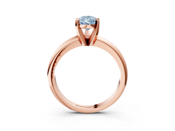 Rose gold Fancy Blue Pear Cut Diamond Solitaire Engagement Ring with Round Band and Four-Prong Setting