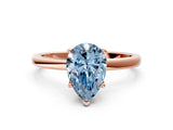 Rose gold Fancy Blue Pear Cut Diamond Solitaire Ring with Classic Band and Four-Prong Setting