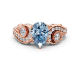 Rose gold Fancy Blue Pear Cut Diamond Solitaire Ring with Milgrain Pavé Band and Four-Prong Setting_155