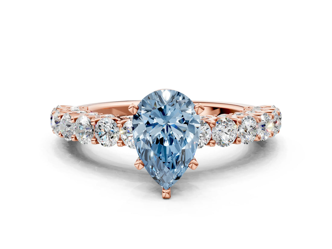 Rose gold Fancy Blue Pear Cut Diamond Solitaire Ring with Shared Prong Pavé Band and Four-Prong Setting_63