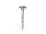 Rose gold Fancy Blue Pear Cut Diamond Solitaire Ring with Shared Prong Pavé Band and Four-Prong Setting_65