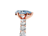Rose gold Fancy Blue Pear Cut Diamond Solitaire Ring with Shared Prong Pavé Band and Four-Prong Setting_68