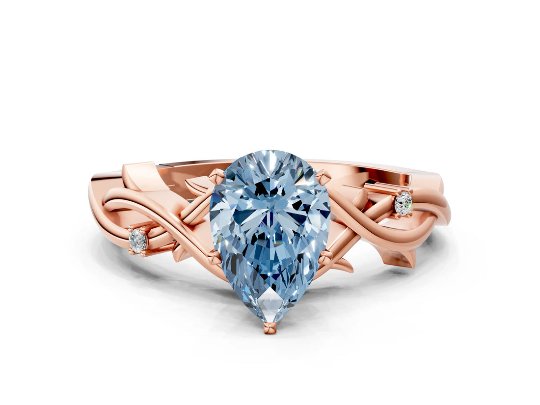 Rose gold Fancy Blue Pear Cut Diamond Solitaire Ring with Twisted Band and Prong Setting_200