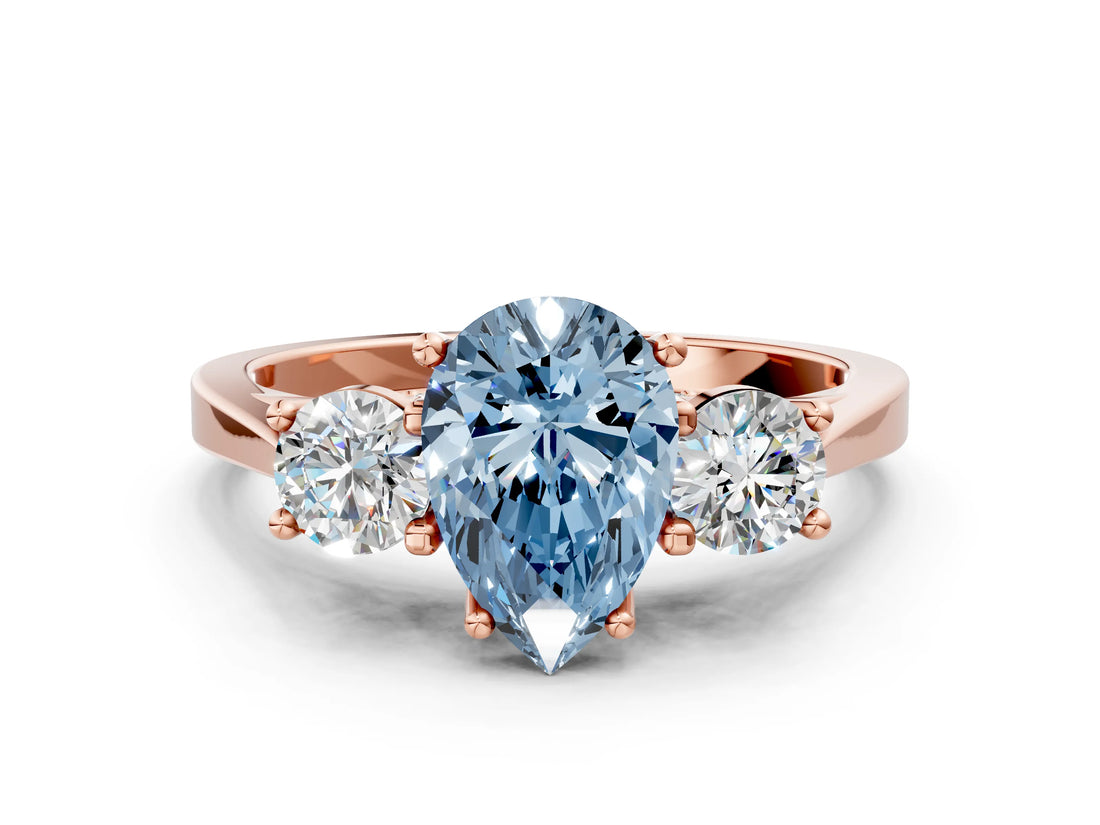 Rose gold Fancy Blue Pear Cut Diamond Three-Stone Engagement Ring with Prong Setting and Pavé Band