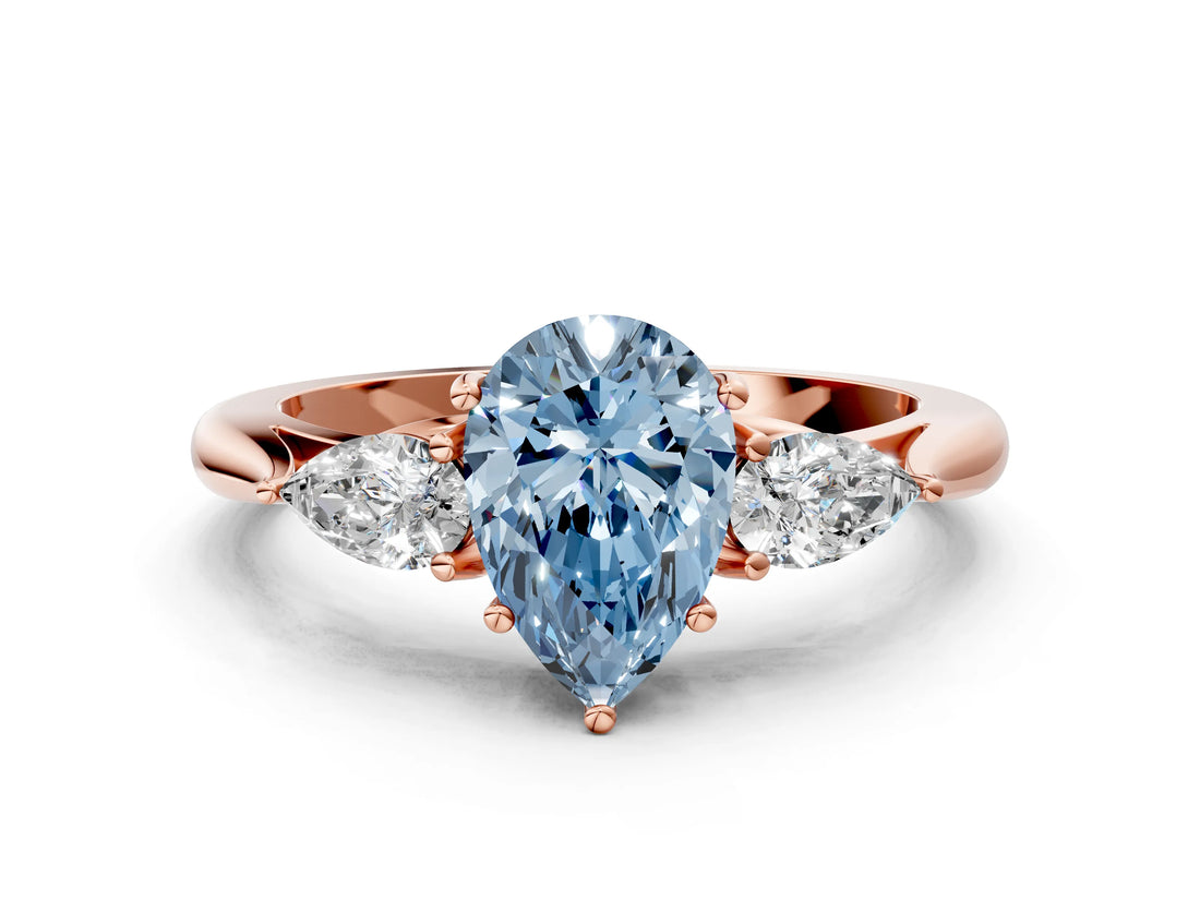 Rose gold Fancy Blue Pear Cut Diamond Three-Stone Ring with Pear Side Stones and Four-Prong Setting_93