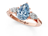 Rose gold Fancy Blue Pear Cut Diamond Three-Stone Ring with Pear Side Stones and Four-Prong Setting_94