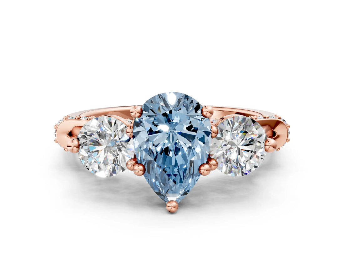 Rose gold Fancy Blue Pear Cut Diamond Three-Stone Ring with Prong Setting and Pavé Band