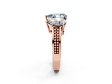 Rose gold Fancy Blue Pear Cut Diamond Three-Stone Ring with Prong Setting and Textured Band_2