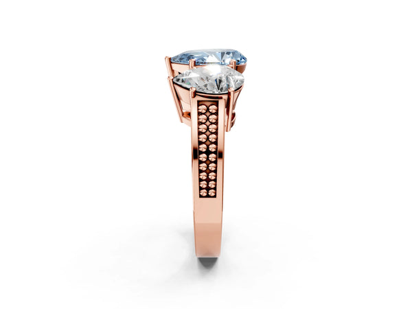 Rose gold Fancy Blue Pear Cut Diamond Three-Stone Ring with Prong Setting and Textured Band