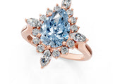 Rose gold Fancy Blue Pear Cut Halo Diamond Cluster Ring with Marquise and Round Stones on a White Gold Band with Prong Setting_1