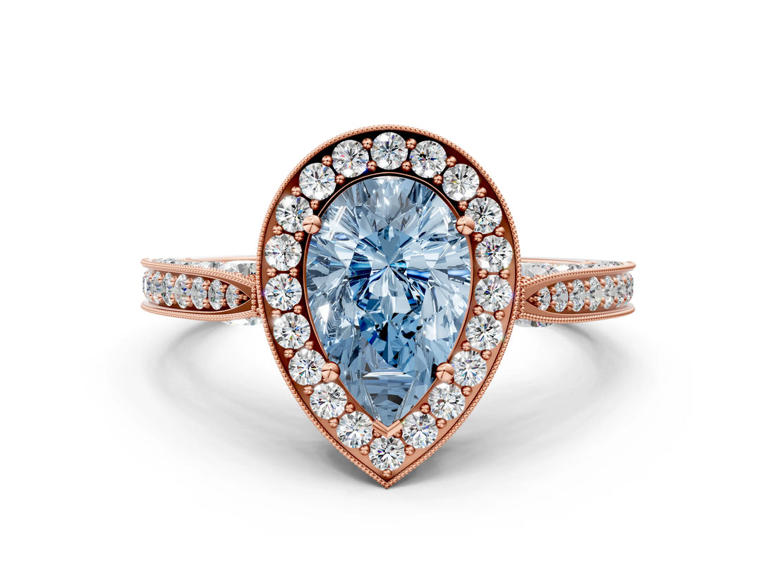 Rose gold Fancy Blue Pear Cut Halo Diamond Engagement Ring with Split Shank Band and Four-Prong Setting