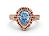 Rose gold Fancy Blue Pear Cut Halo Diamond Ring with Beaded Split Shank and Four-Prong Setting