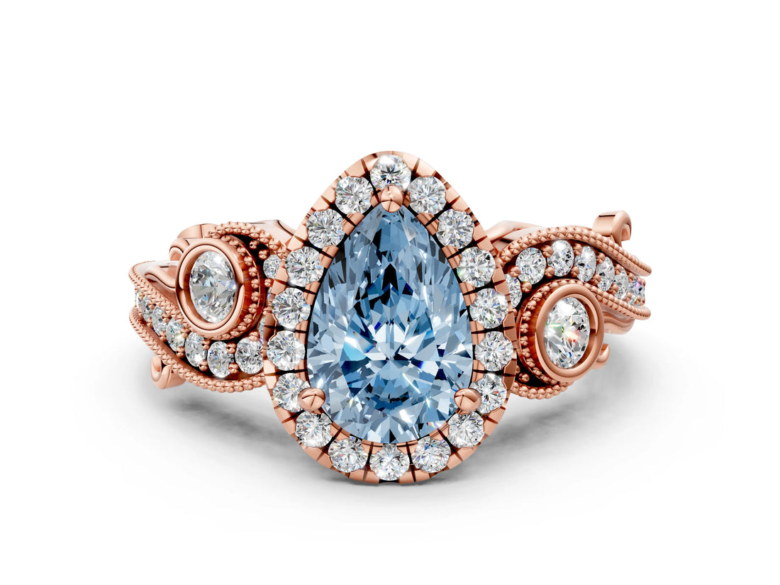 Rose gold Fancy Blue Pear Cut Halo Diamond Ring with Milgrain and Bezel Accents on a Split Shank Band_12