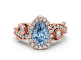 Rose gold Fancy Blue Pear Cut Halo Diamond Ring with Milgrain and Bezel Accents on a Split Shank Band_12
