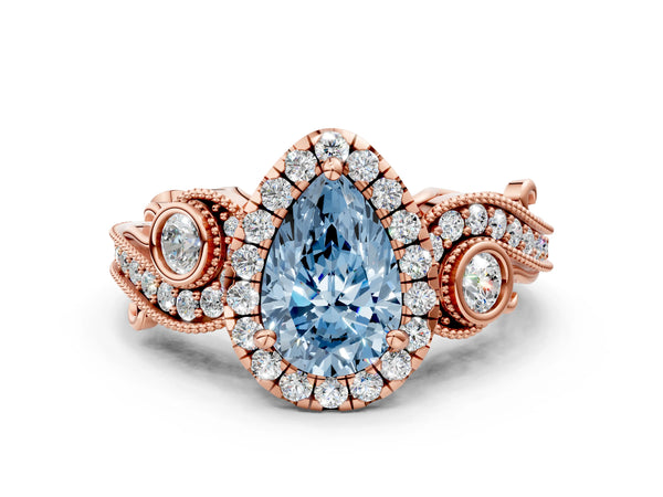 Rose gold Fancy Blue Pear Cut Halo Diamond Ring with Milgrain and Bezel Accents on a Split Shank Band
