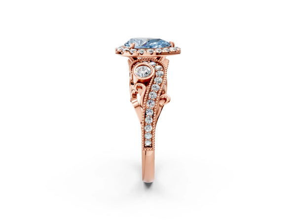 Rose gold Fancy Blue Pear Cut Halo Diamond Ring with Milgrain and Bezel Accents on a Split Shank Band