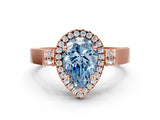 Rose gold Fancy Blue Pear Cut Halo Round Diamond Twist Band with Four-Prong Setting