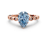 Rose gold Fancy Blue Pear Cut Solitaire Diamond Ring with Infinity Twist Band and Four-Prong Setting