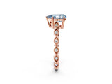 Rose gold Fancy Blue Pear Cut Solitaire Diamond Ring with Infinity Twist Band and Four-Prong Setting_2