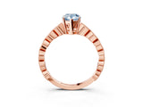 Rose gold Fancy Blue Pear Cut Solitaire Diamond Ring with Infinity Twist Band and Four-Prong Setting_3